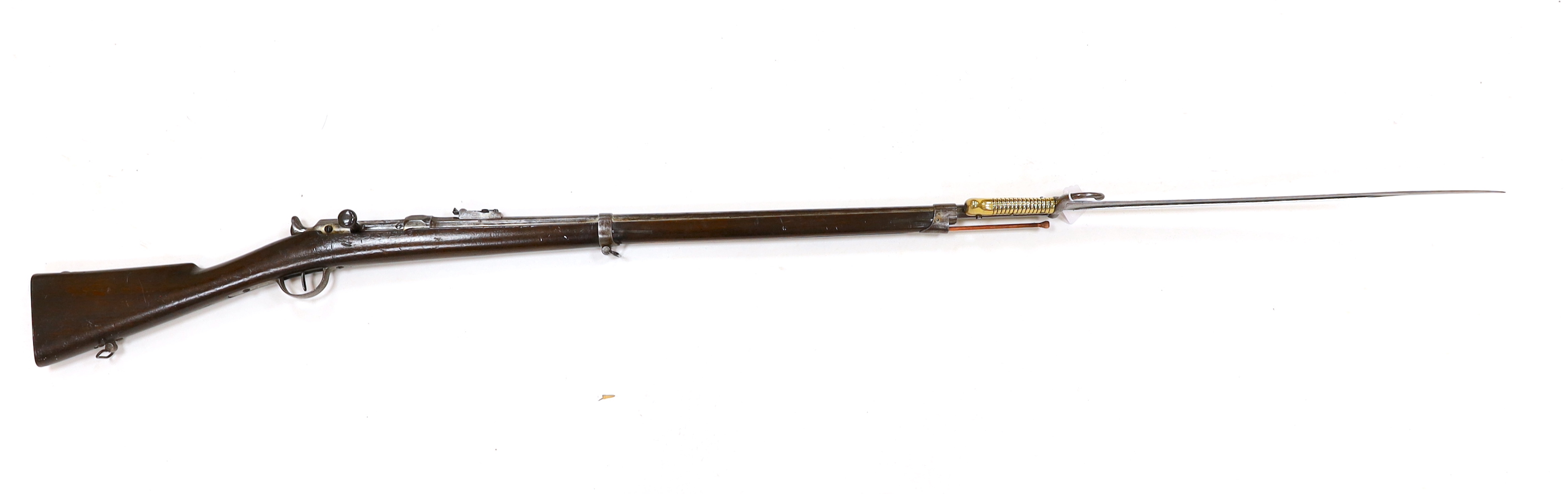 A French Chassepot bolt action rifle 1865-1874 with regulation, iron mounts, and 1868 brass handle bayonet dated 1868, barrel 79cm